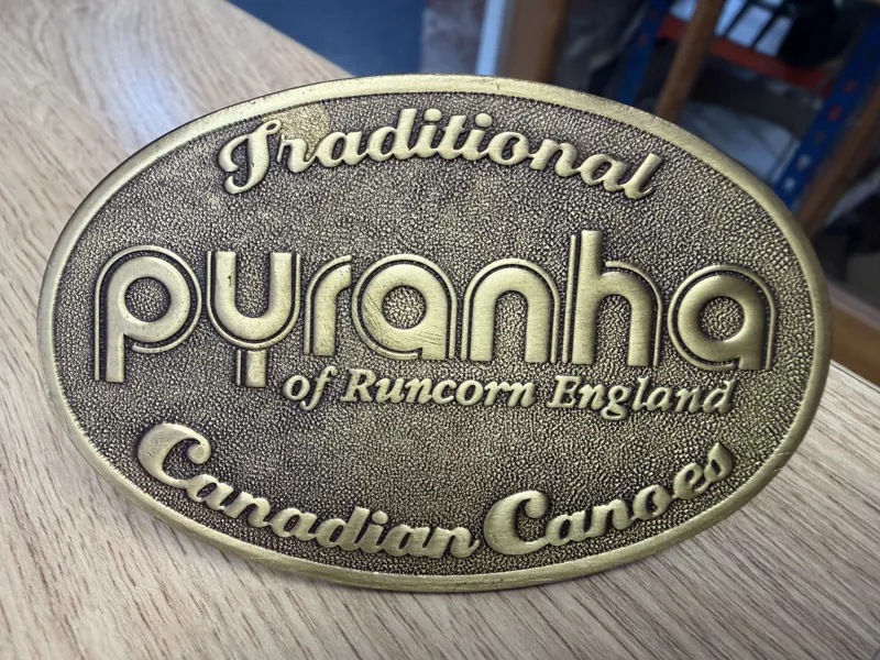 Classic Pyranha Brass Badge
